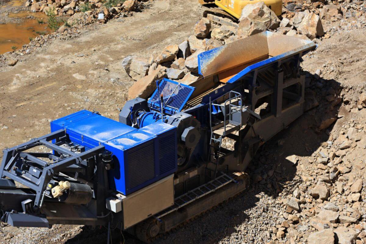 Mining equipment operating on-site, highlighting heavy-duty machinery used for large-scale excavation and industrial resource extraction.