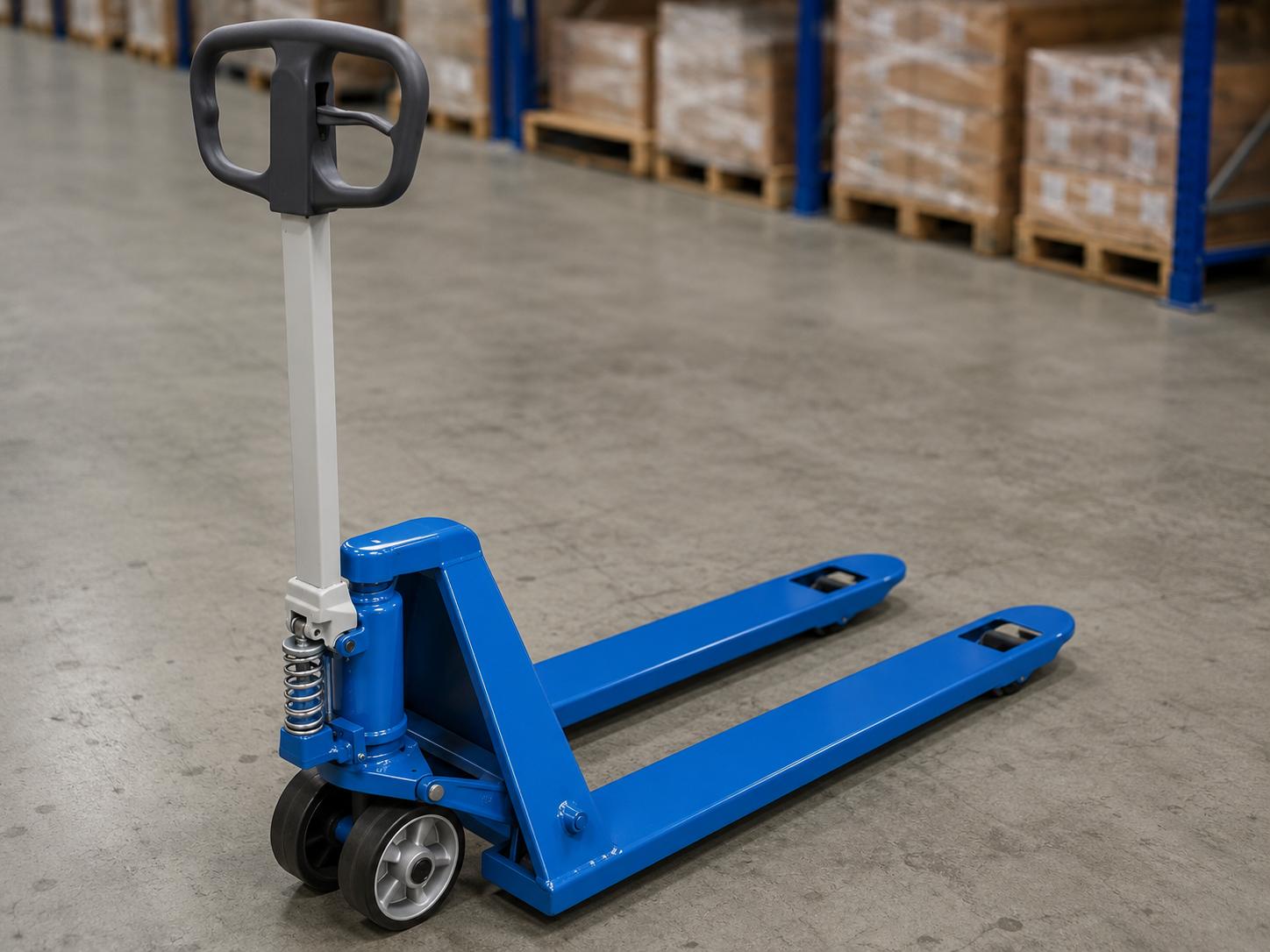 Blue hand pallet truck showing reinforced forks, hydraulic pump, wheels, and handle